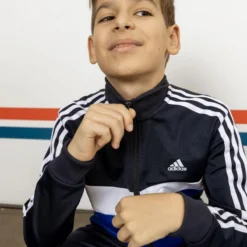 ADIDAS TRAININGSPAK VOOR KINDEREN COLORBLOCK BLAUW -Mode Geest Verkoop trainingspak voor kinderen colorblock blauw 9