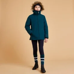 Warme En Waterdichte Kinderparka Voor Paardrijden 500 Warm 11 Warme En Waterdichte Kinderparka Voor Paardrijden 500 Warm -Mode Geest Verkoop warme en waterdichte paardrijparka voor kinderen 500 warm petrolgroen 1